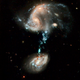 Illustration for article titled The Cosmic Wonder of Colliding Galaxies